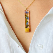 Resin Bar Pendant Necklace with Palo Santo and Forget-me-not Flowers  on model