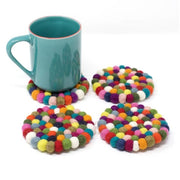 Fair Trade Set of Four Rainbow Felt Ball Coasters styled