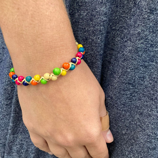 Rainbow Achira Seed Bracelet on model