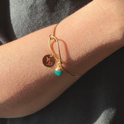 Zodiac Charm and Bead Bangle Bracelet on model