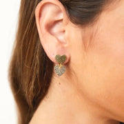Metallic Petite Heart Stud Earrings on model