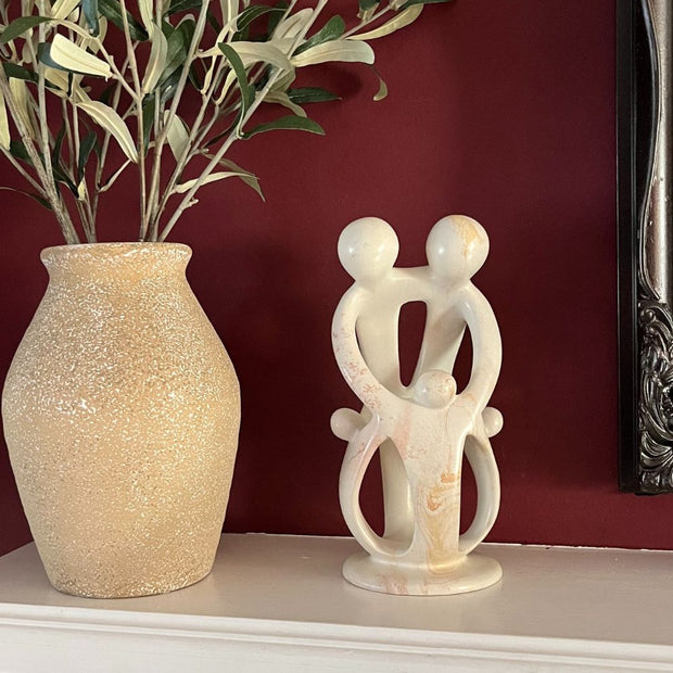 Family Soapstone Sculpture featuring two Parents and three Children styled